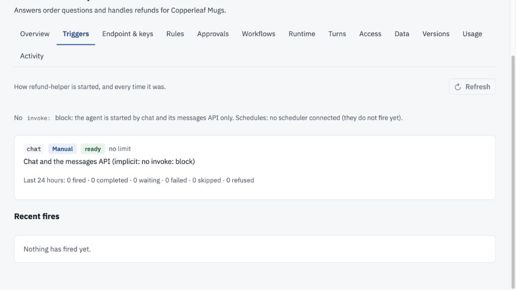 Triggers tab showing the implicit chat trigger as Manual and ready, a disconnected scheduler notice, and an empty Recent fires list.